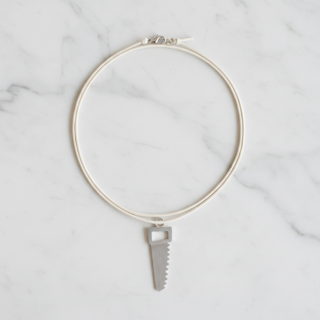 Saw Blade Necklace – White Cord | Silver Metal Pendant